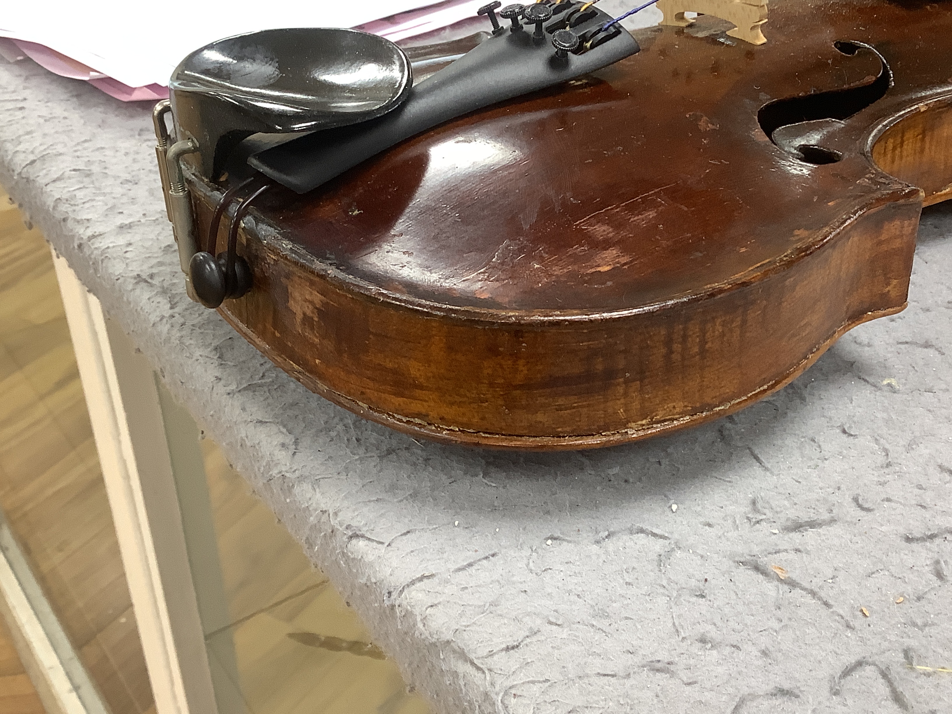 A 19th century English violin, bears hand written paper label, a modern Stentor violin and a metronome